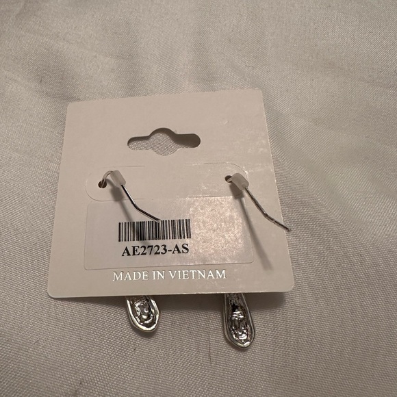 BRAND NEW Silver tone smaller cross earrings. - Picture 2 of 2